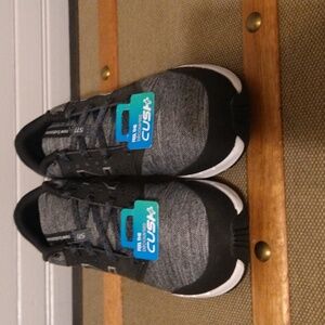 New balance black and grey and white cushion shoes. NEW